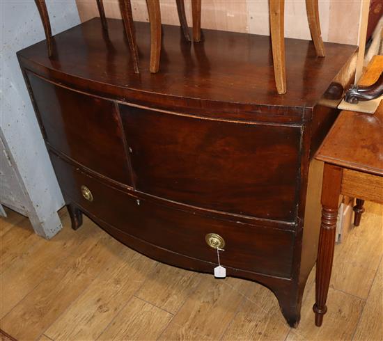 A 19th century bowfront mahogany cabinet W.107cm